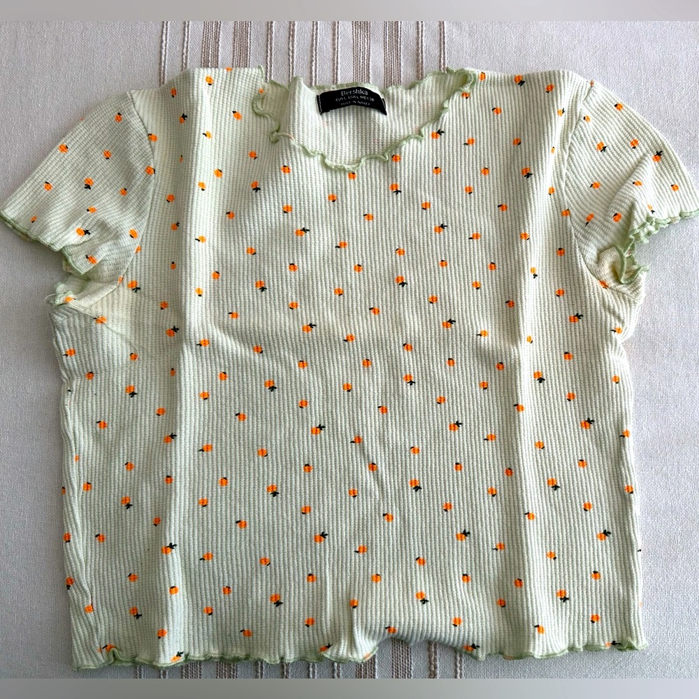 Bershka pastel green top with highlighter orange pattern crop top